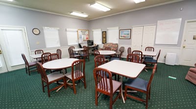 Interior common area with tables and chairs