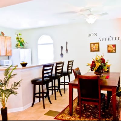 Bright dining area with a table and chairs