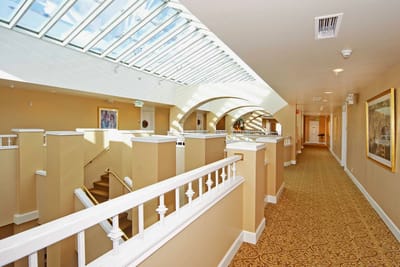 Interior hallway with natural light and decor