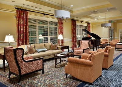 Interior common area with seating and piano
