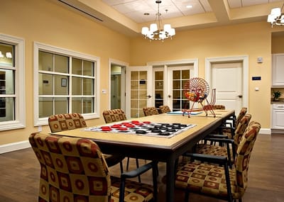 Activity room with a large table and game equipment