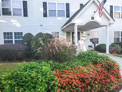Entrance of Ashton Arbors with colorful landscaping