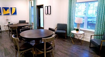 Interior common area with tables and chairs