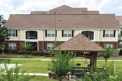 Exterior view of Ashton Meadows Apartments with outdoor space