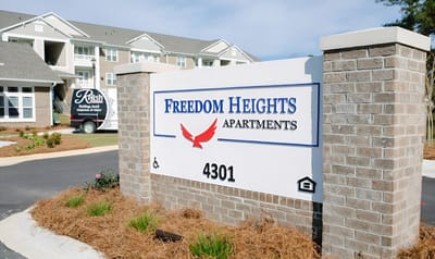 Exterior sign of Freedom Heights Apartments