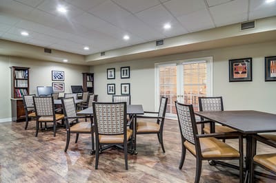 Interior view of a common area with tables and chairs