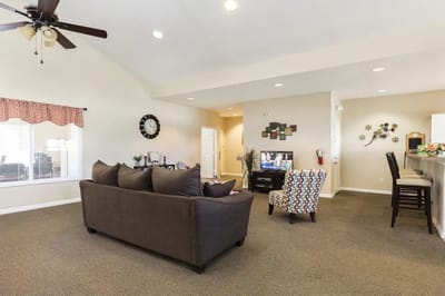 Bright interior common area with seating and decor