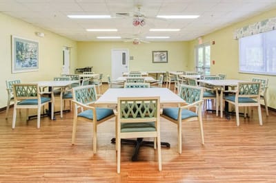 Bright common area with tables and chairs