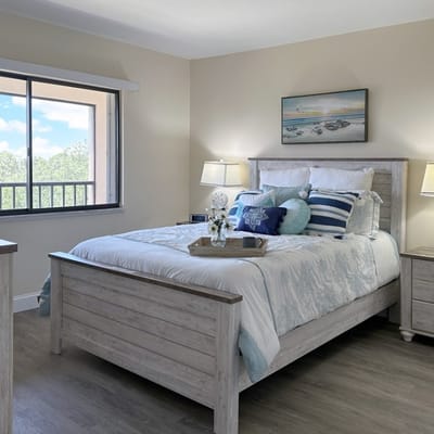 Bright, inviting bedroom in a senior living facility