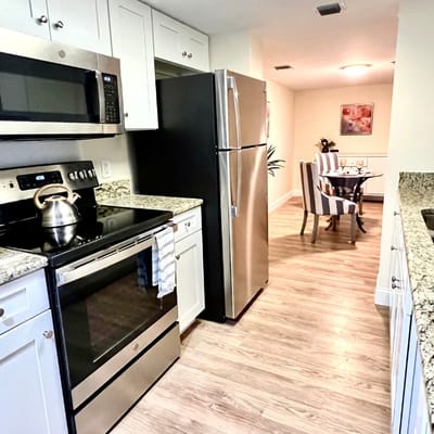 Bright kitchen area with modern appliances