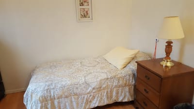 Cozy single bed in a private resident room