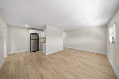 Bright, spacious interior view of an apartment kitchen