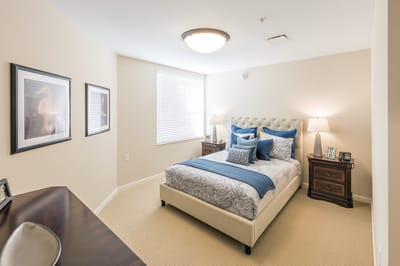 A well-decorated private bedroom in a senior living facility