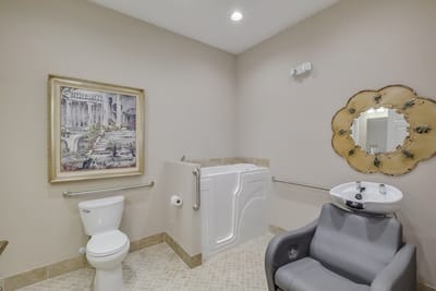 Interior view of a bathroom with a walk-in tub