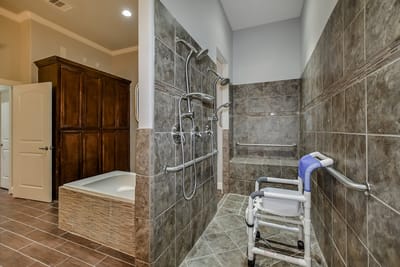 Accessible bathroom with safety features and grab bars