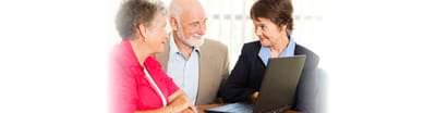 Residents and staff engaged in a conversation.