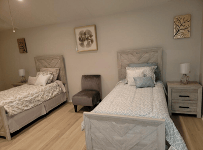 Two twin beds in a shared resident room
