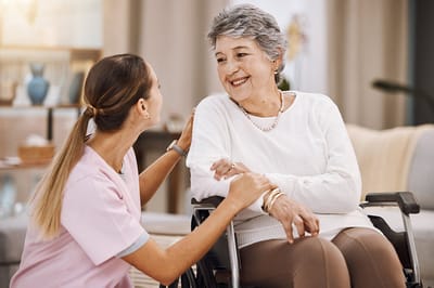 Staff member interacting with a senior resident