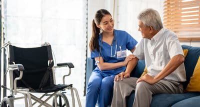 Staff member engaging with a senior resident