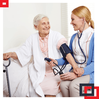 Nurse taking a patient's blood pressure