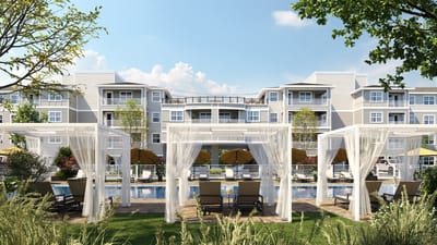 Outdoor pool area with lounge chairs and cabanas