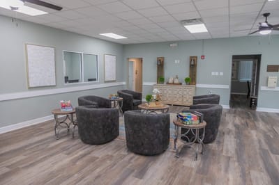Common area with comfortable seating and games