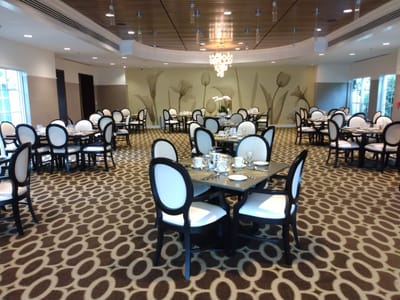 Dining room with tables set and modern decor