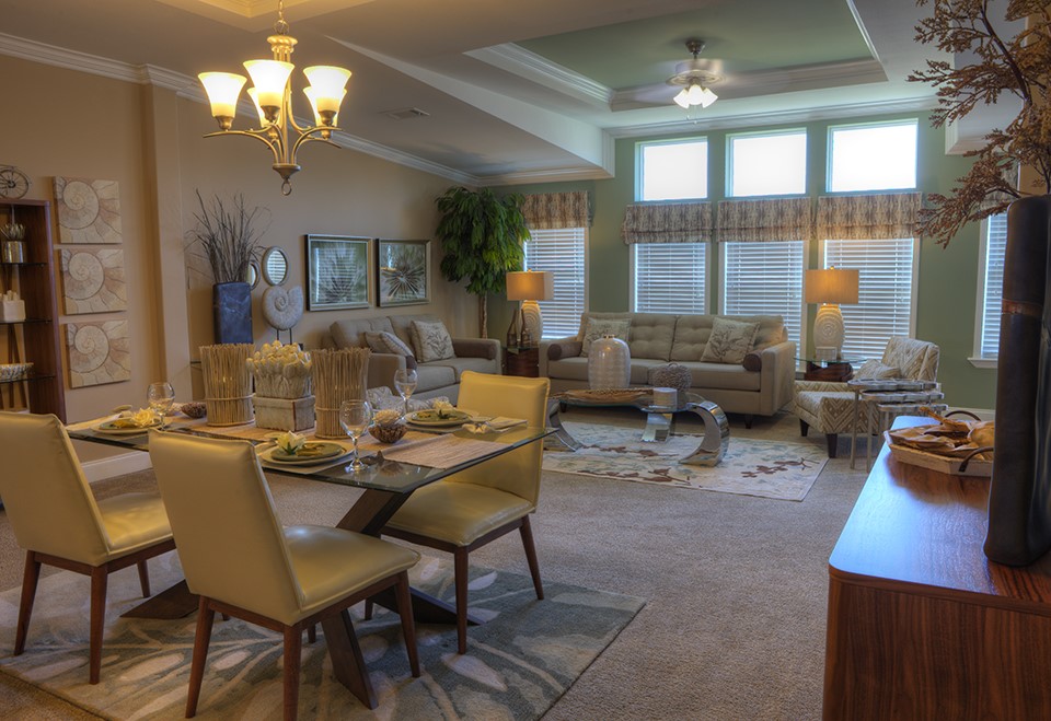 Well-decorated dining room with table settings