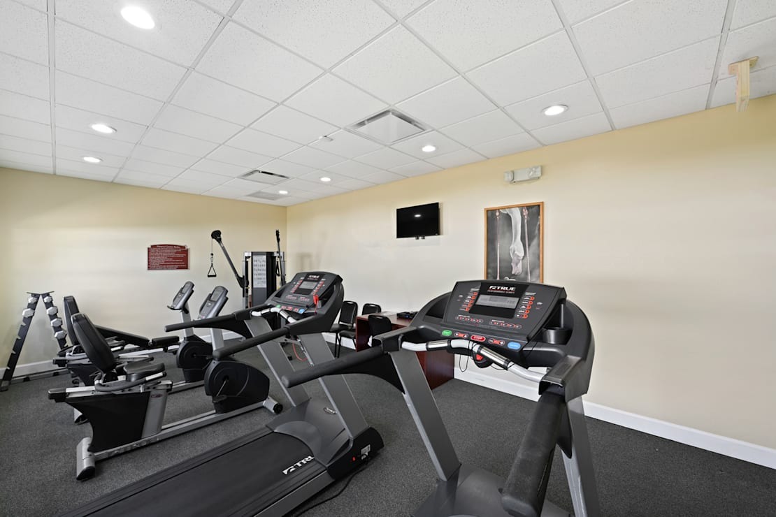 Interior view of a fitness room with gym equipment