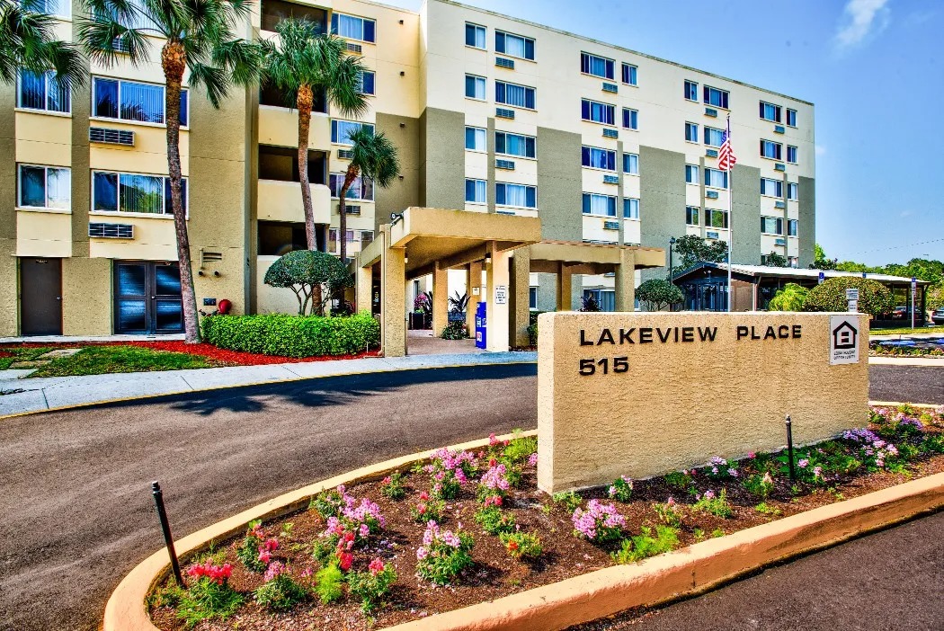 Exterior view of Lakeview Place with signage and landscaping