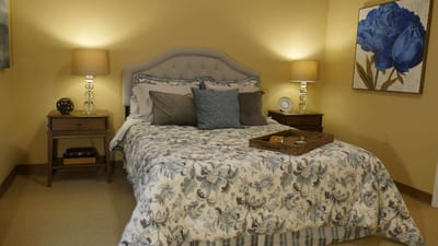 Cozy private bedroom with floral bedding