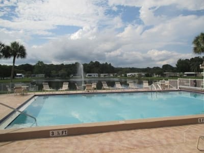 View of the outdoor swimming pool and lake