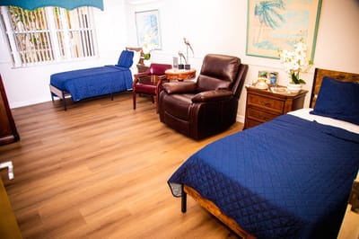 A cozy shared resident room with two beds