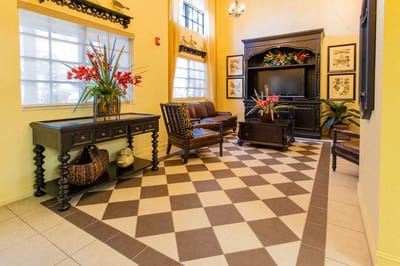 Bright common area with seating and decor
