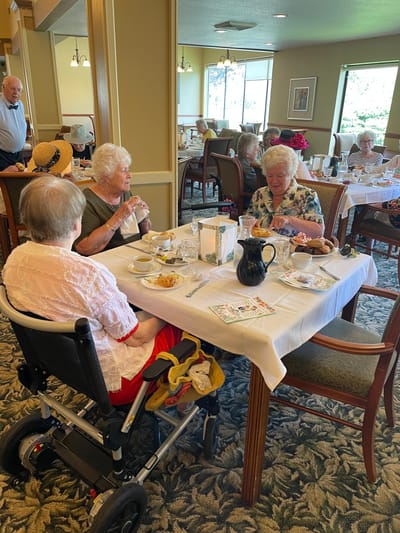 Residents enjoying lunch in a dining area
