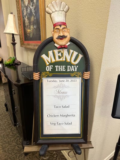 Menu of the day displayed in a dining area