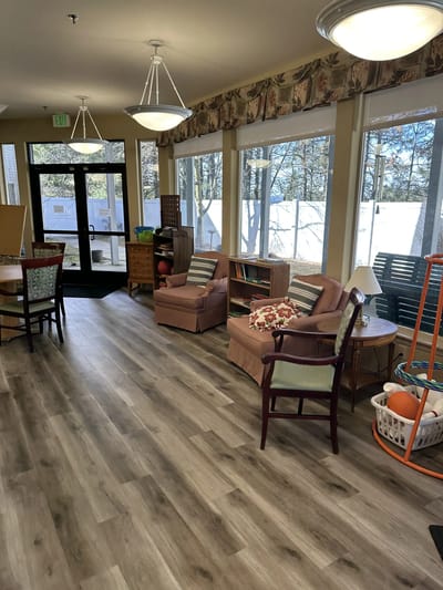Bright common area with seating and natural light