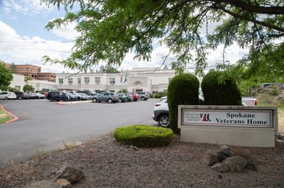 Entrance view of Spokane Veterans Home with parking area