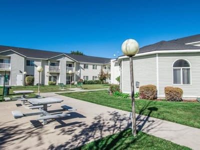 Outdoor seating area with landscaped grounds