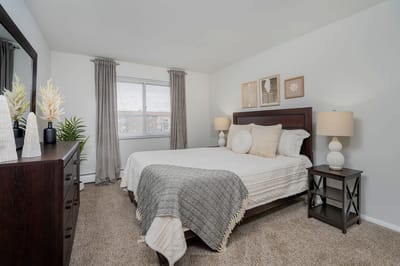 A cozy bedroom in a senior living apartment