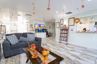 Bright common area with seating and decorations