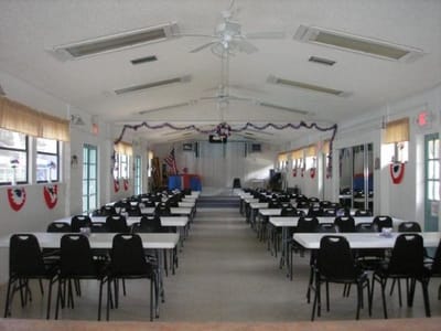 Interior view of a dining area with tables and chairs