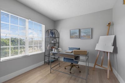 Interior view of a well-decorated room with a desk
