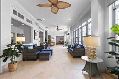 Bright common area with comfortable seating and decor