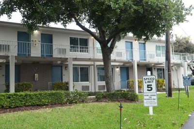 Exterior view of Gateway Terrace Senior Apartments with greenery