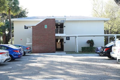 Exterior view of a building with parking spaces