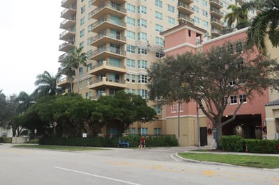 Exterior view of the Sunrise Harbor building with landscaping