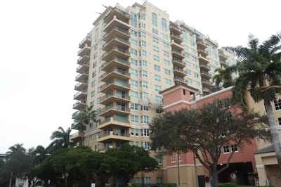 Exterior view of Sunrise Harbor facility with landscaping