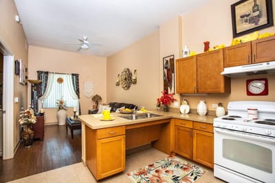 Bright kitchen area with modern appliances and decor