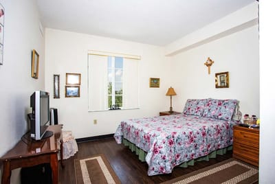 Cozy resident room with floral bedding